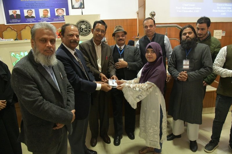 AMU VC Prof Mohd Gulrez distributing the gadgets during the International Disability Day 2